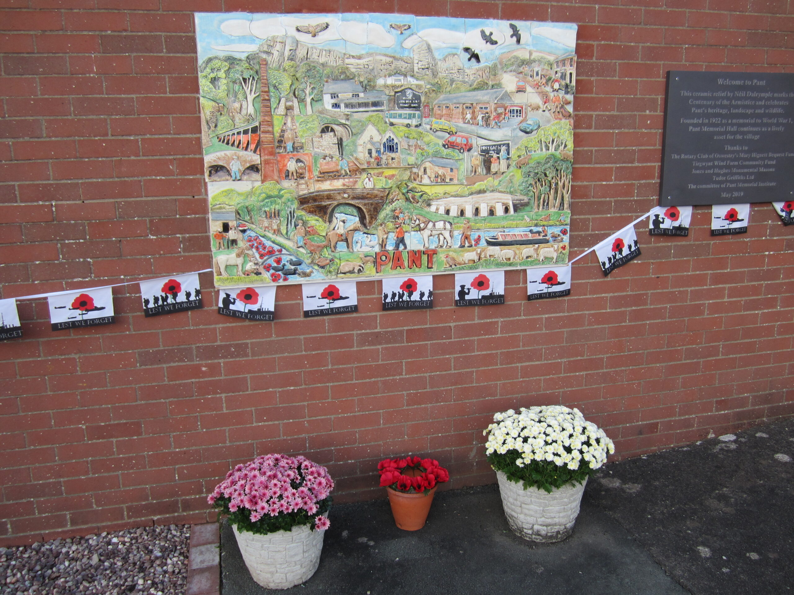 bunting and poppies with the #armistice100 artwork